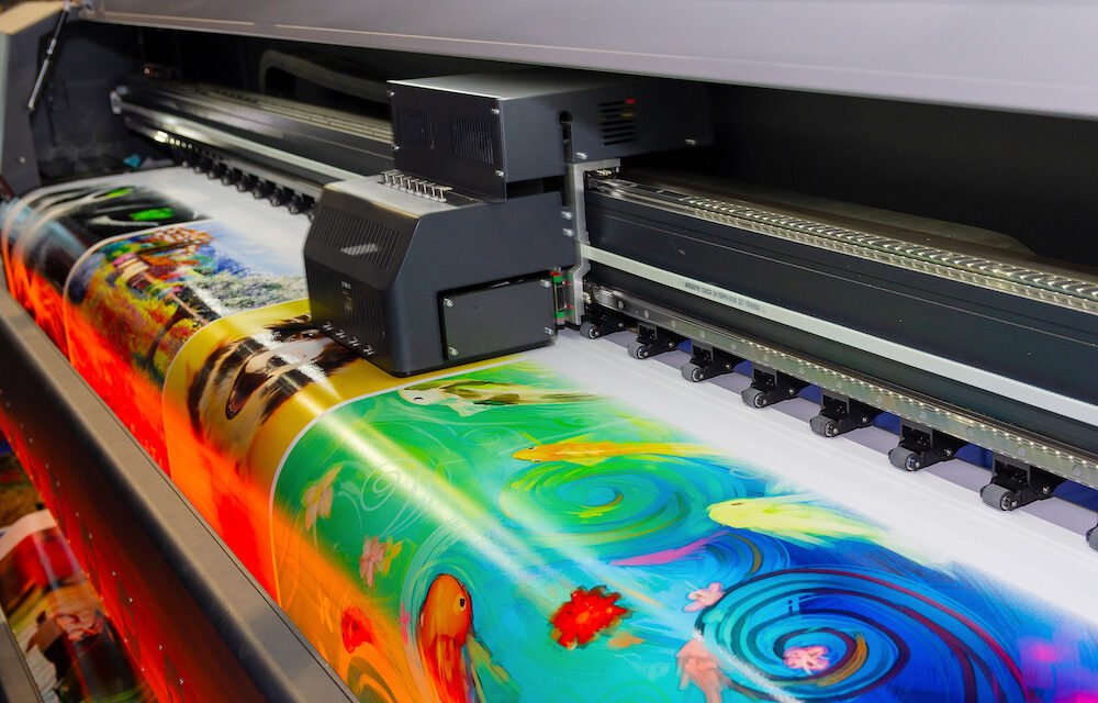 Large format printing machine in operation. Industry